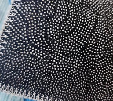 リビング ルームのカーペットの裏地のクローズ アップ